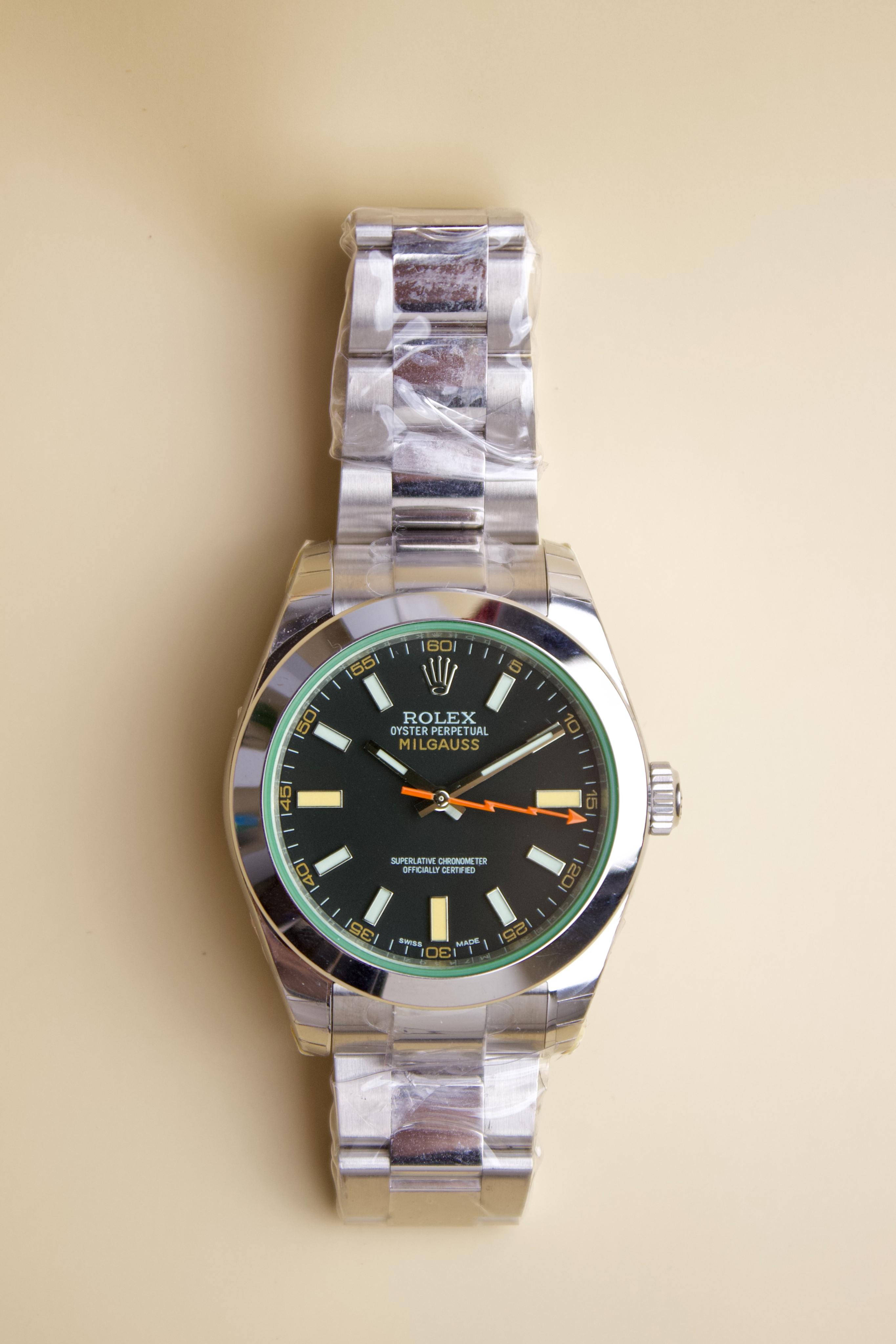 ROLEX MILGAUSS BLACK DIAL WITH GREEN CRYSTAL STAINLESS STEEL