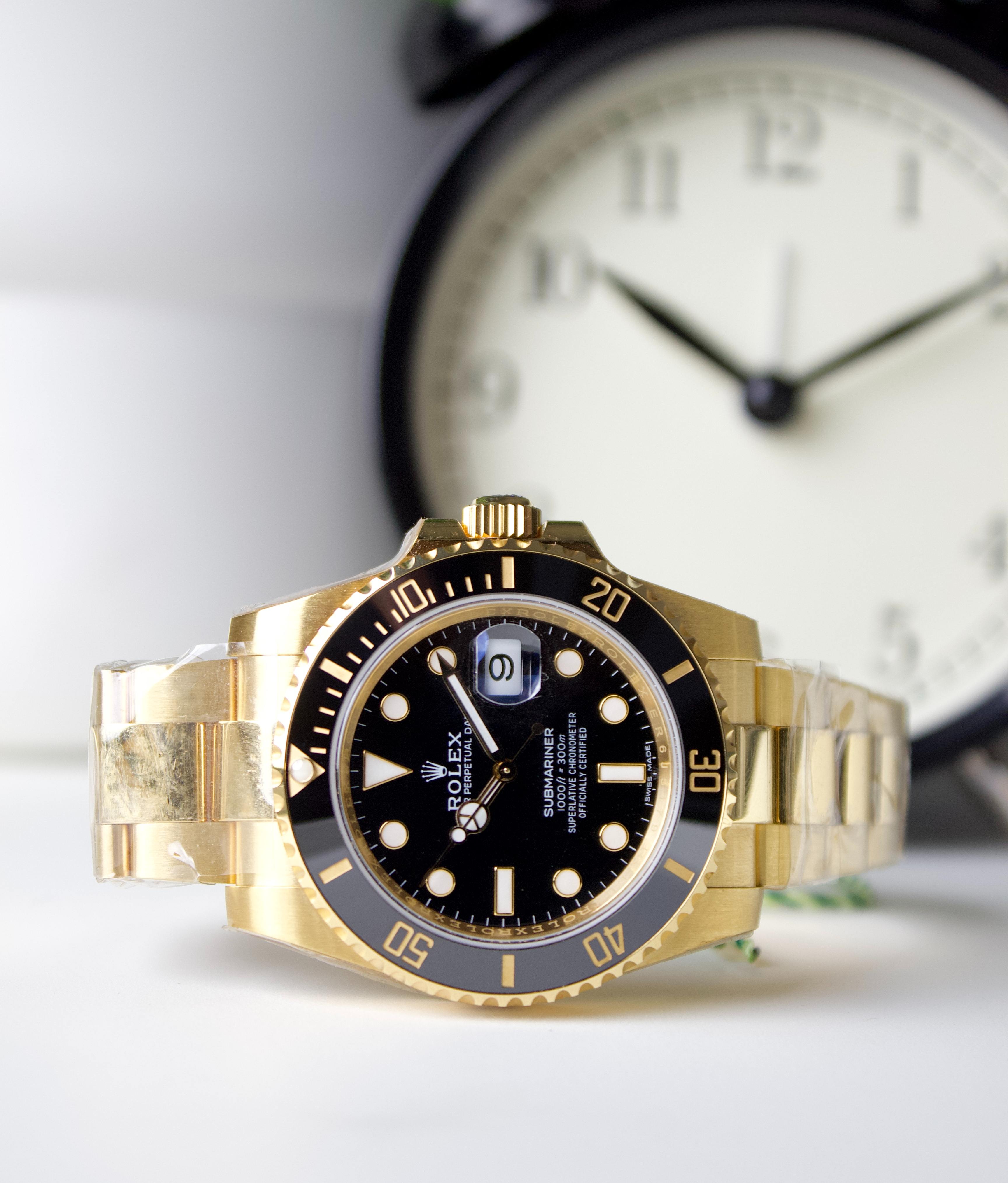 ROLEX SUBMARINER YELLOW GOLD BLACK