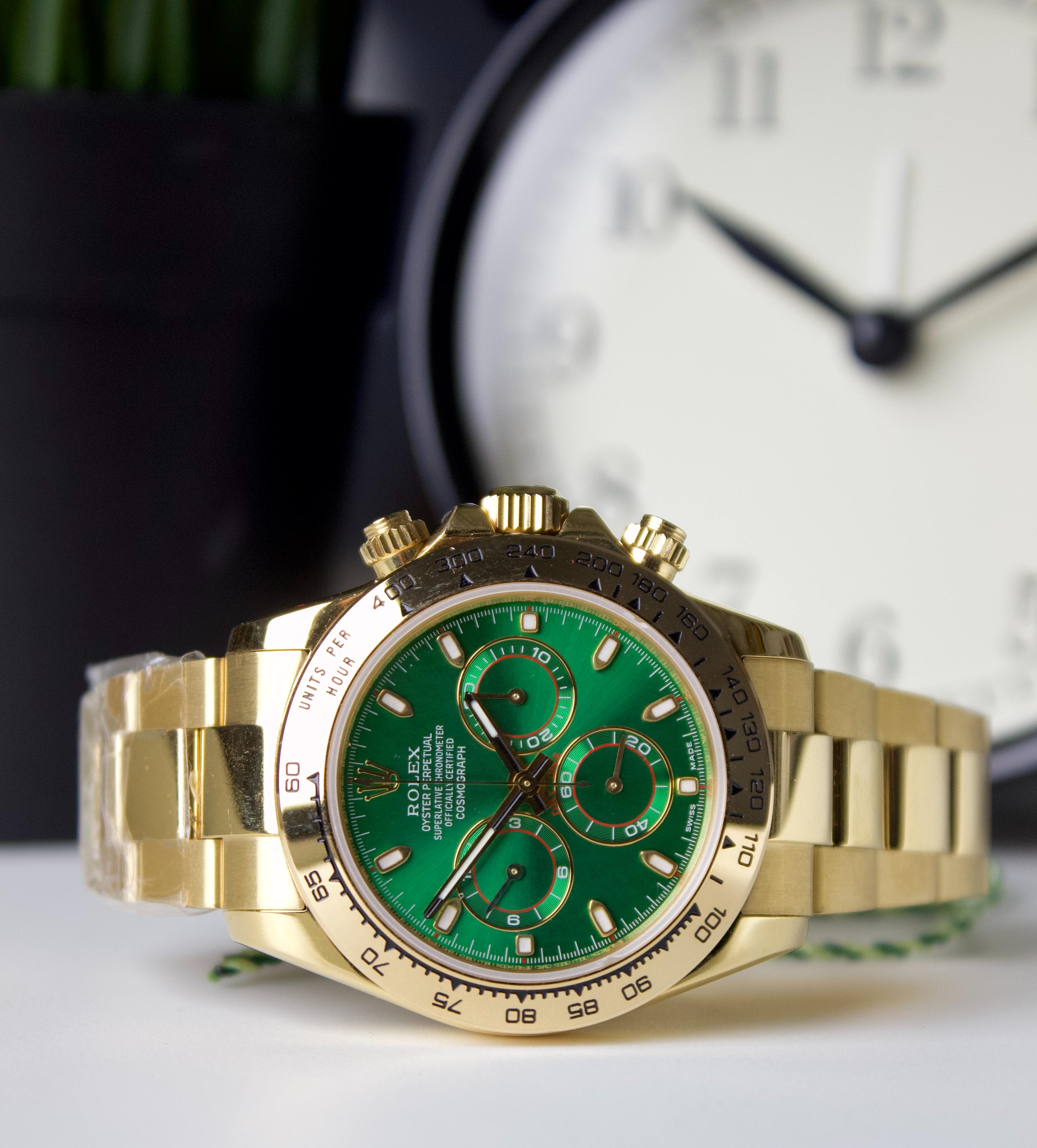 ROLEX DAYTONA YELLOW GOLD & GREEN DAIL