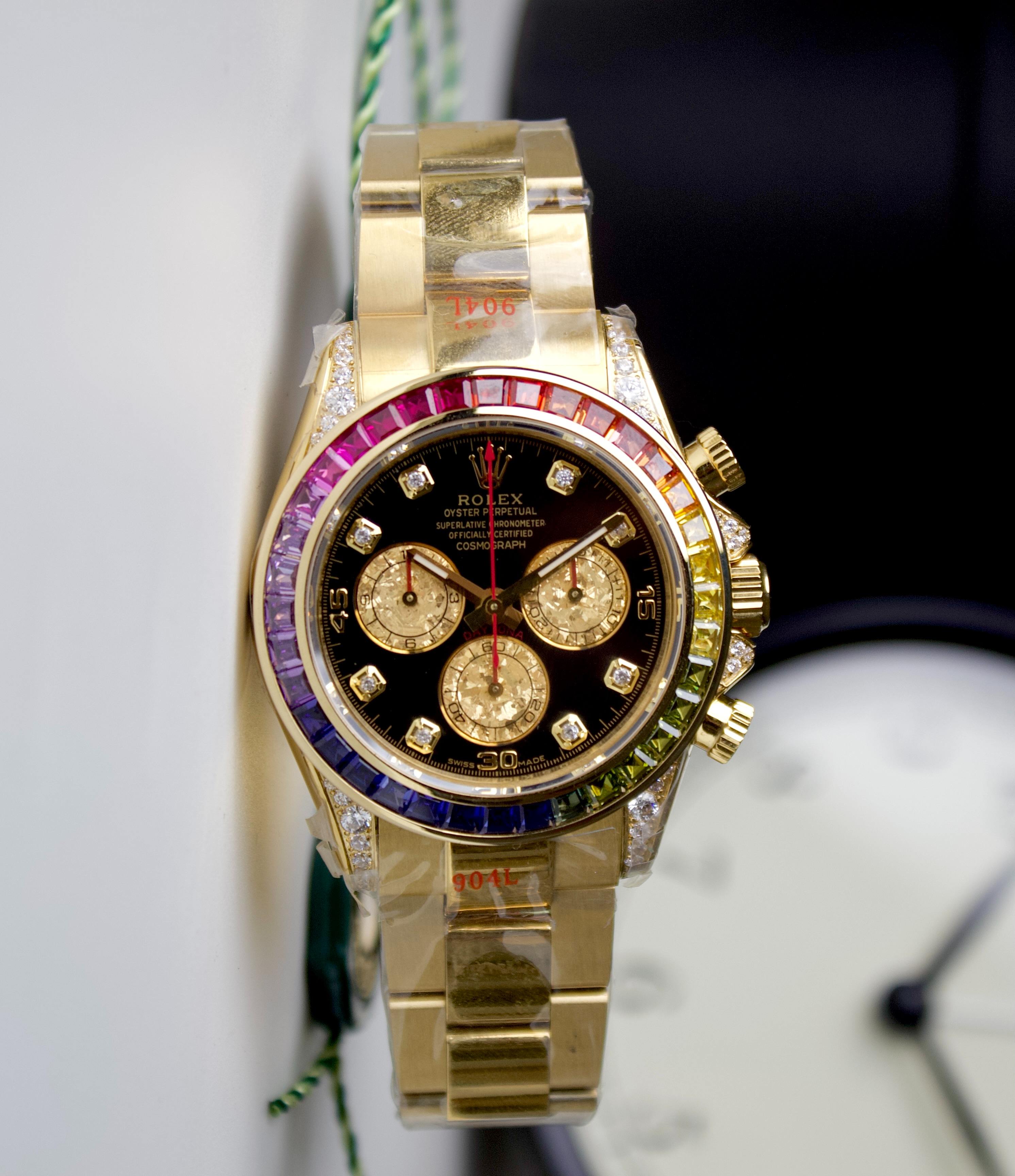 ROLEX DAYTONA YELLOW GOLD RAINBOW