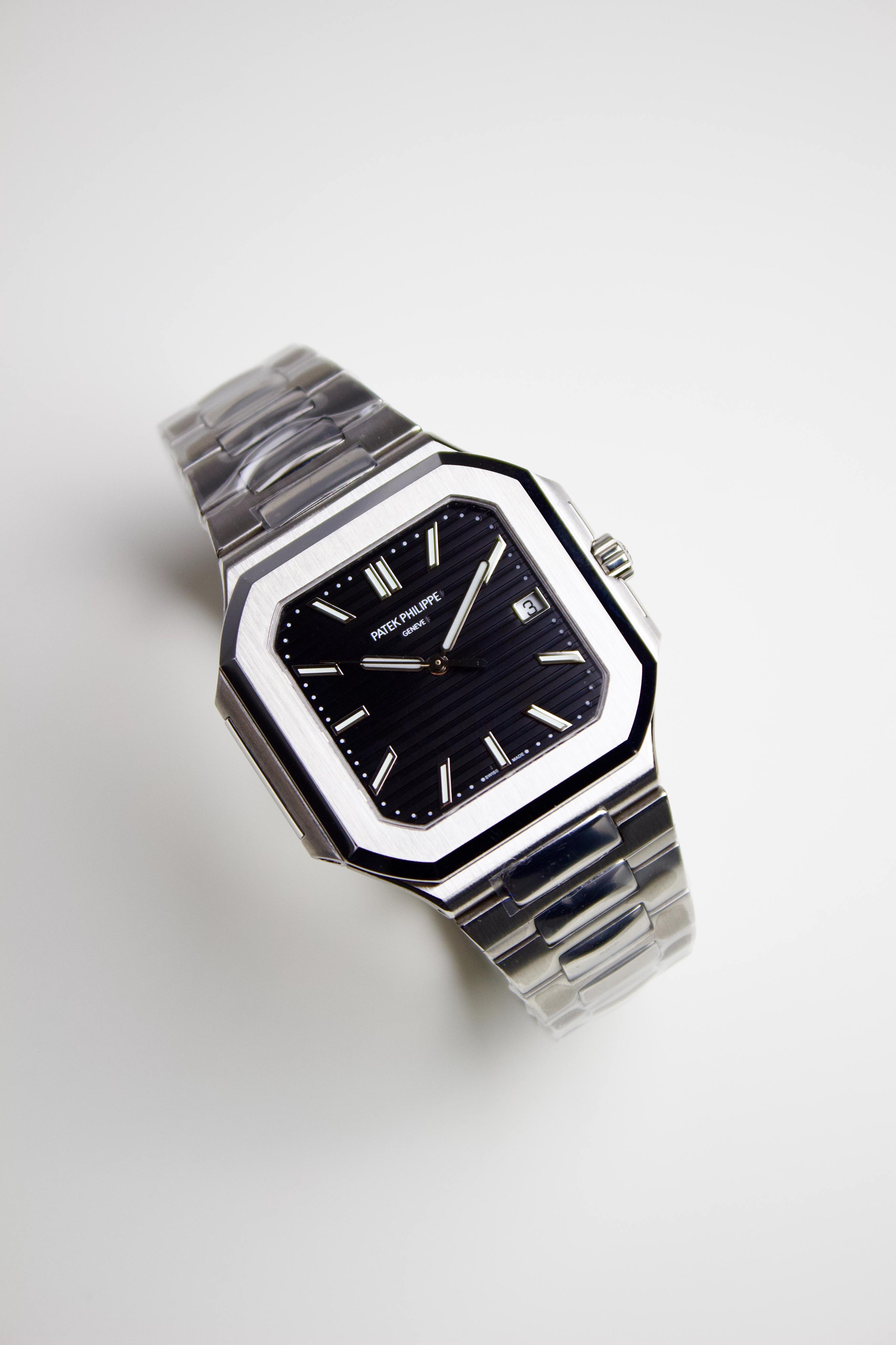 PATEK PHILIPPE CUBITOS STAINLESS STEEL BLACK DIAL