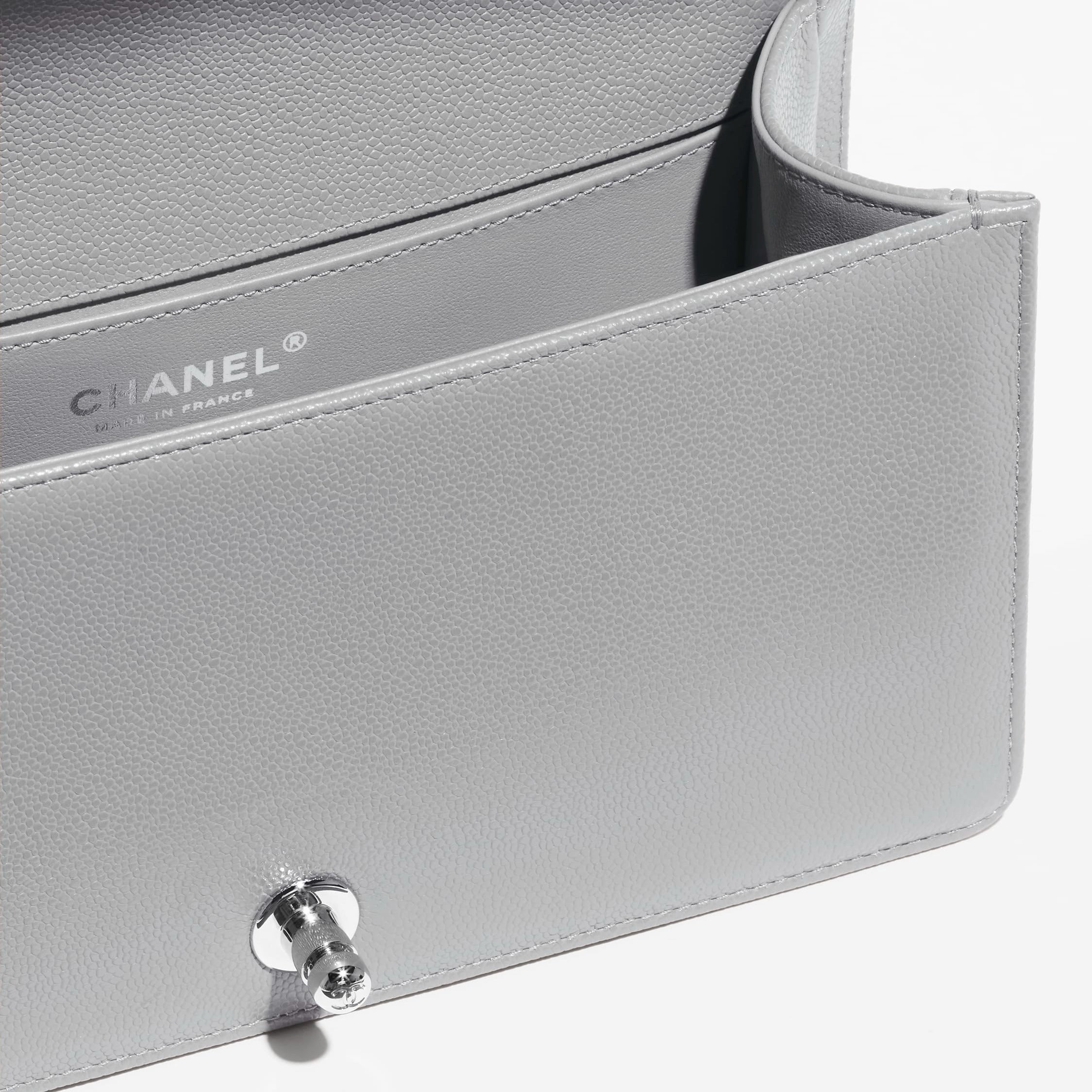 CHANEL  Shiny grained calfskin silver tone metal grey