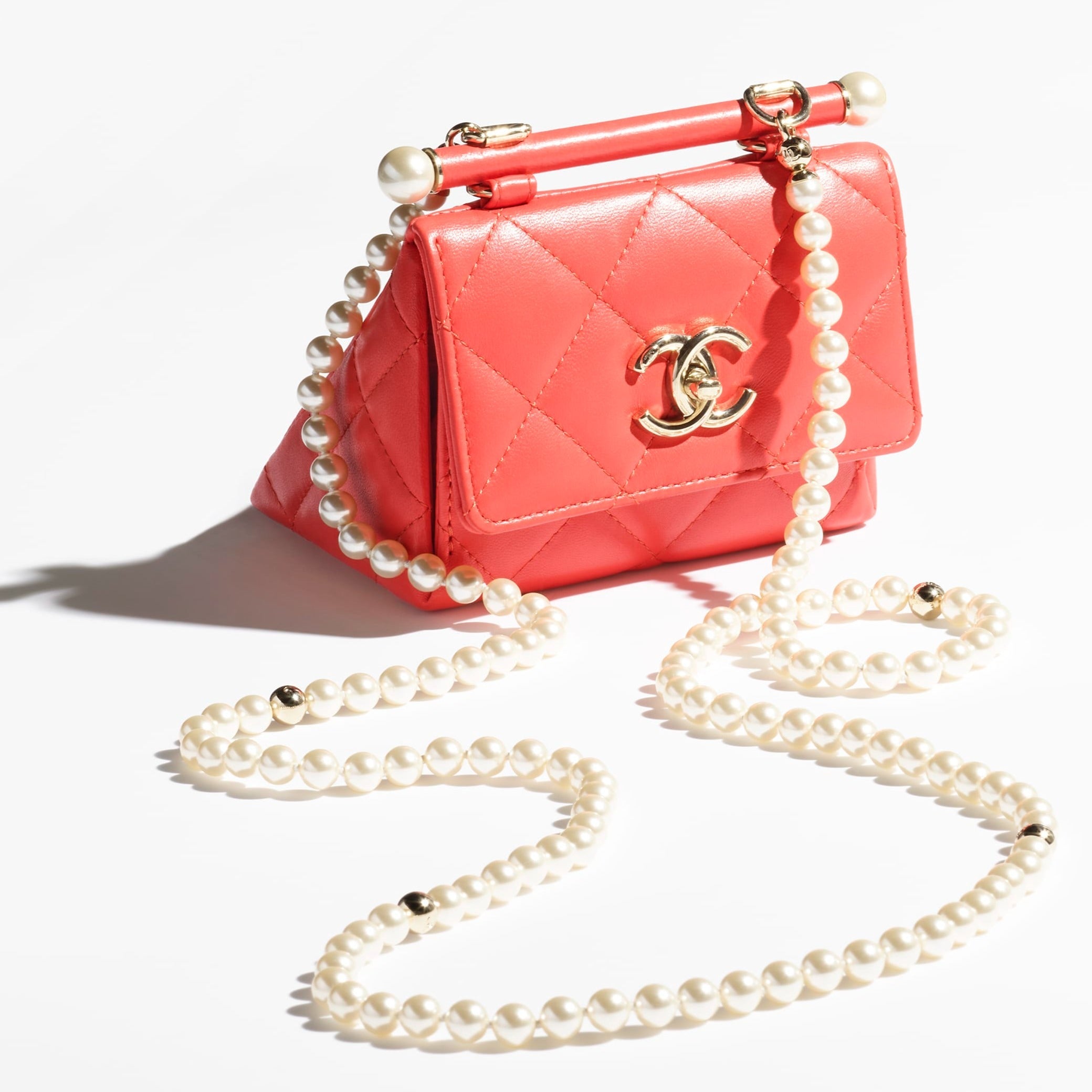 CHANEL  Clutch with chain Lambskin  imitation pearls  gold metal red